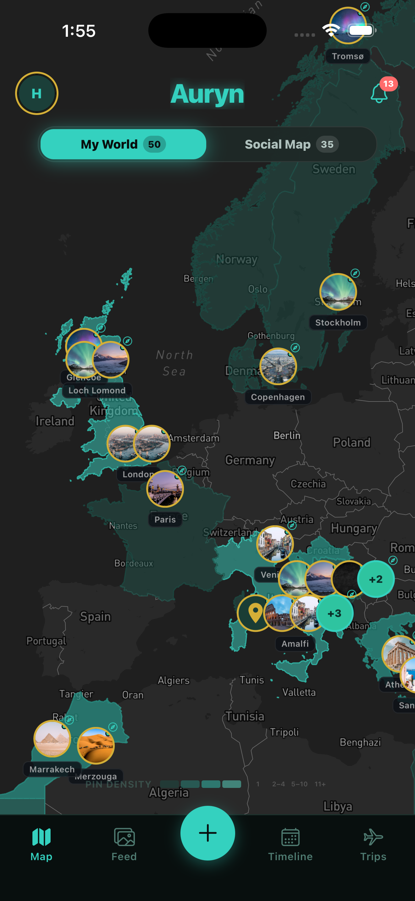 Auryn map screen showing photo bubbles across Europe